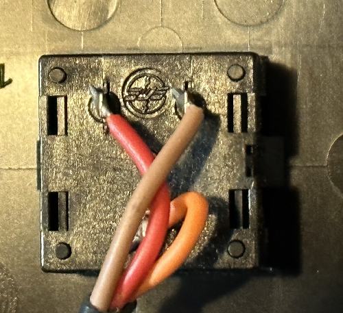 A small switch with three wires