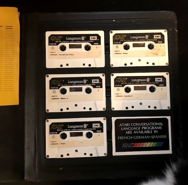 Five cassette tapes in a box