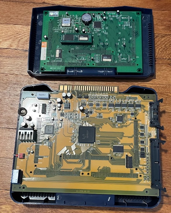 The PGM2 and its cartridge both opened.