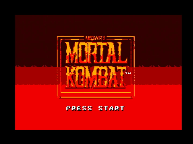 Mortal Kombat title screen. It is red now, but only takes up a small part of the screen-- the Game Gear region, specifically