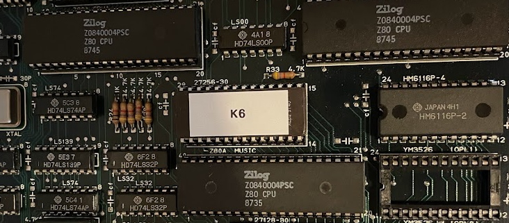 Athena circuitboard showing three Z80 CPUs, and an empty socket in the bottom right