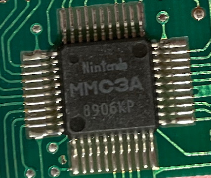 A small surface-mount IC labeled Nintendo MMC3A