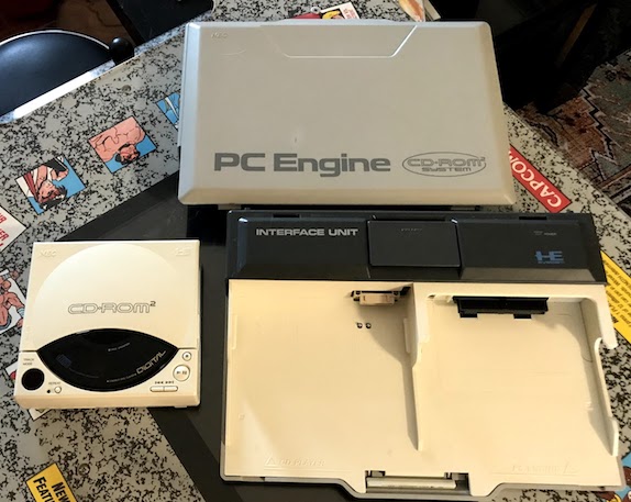 The PC Engine Interface Unit, open, and with the CD-ROM2 off to the side