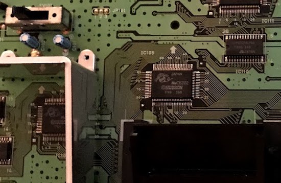 A photo of a SuperGrafx motherboard centered on the HuC6202