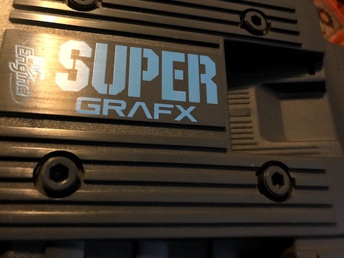 A SuperGrafx console closeup, showing what look like hex screws are just molded plastic