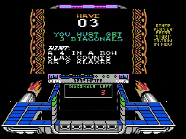 Klax gameplay with a message overlaying the screen