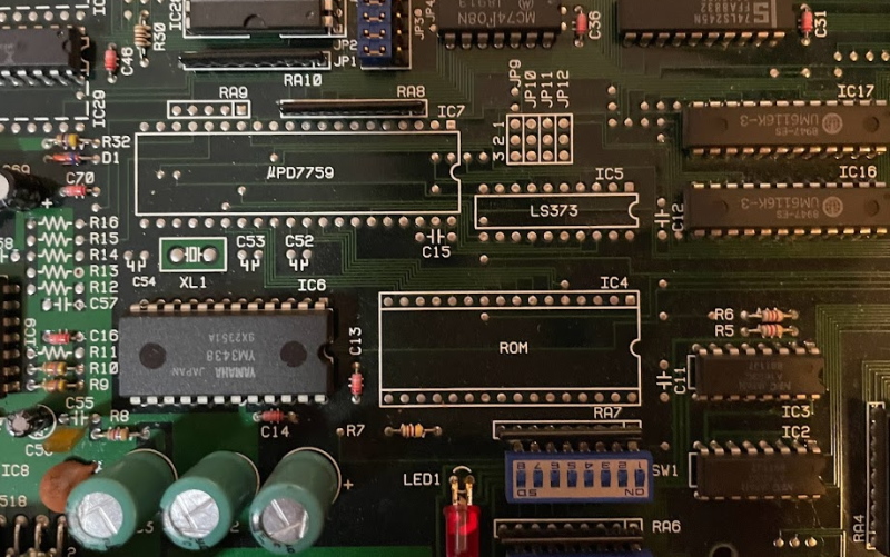 A few solder holes where there should be a chip, but there isn't