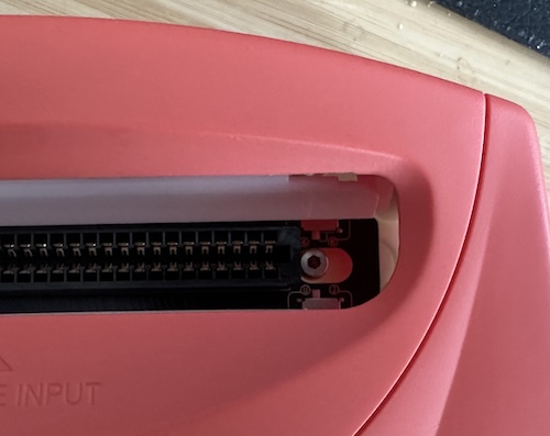 that desk cover is fake leather, don't worry Showing how accessible the switches are from the cartridge port