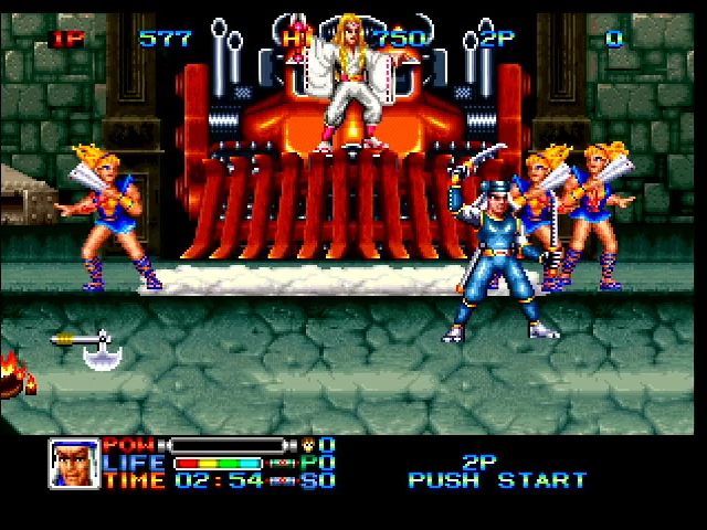 A boss walks around holding two knives while a bunch of women in blue dresses stand around a woman in white standing on a train