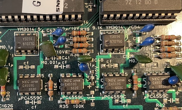 The tiny Y3014 chips underneath the larger synthesizer and ROM