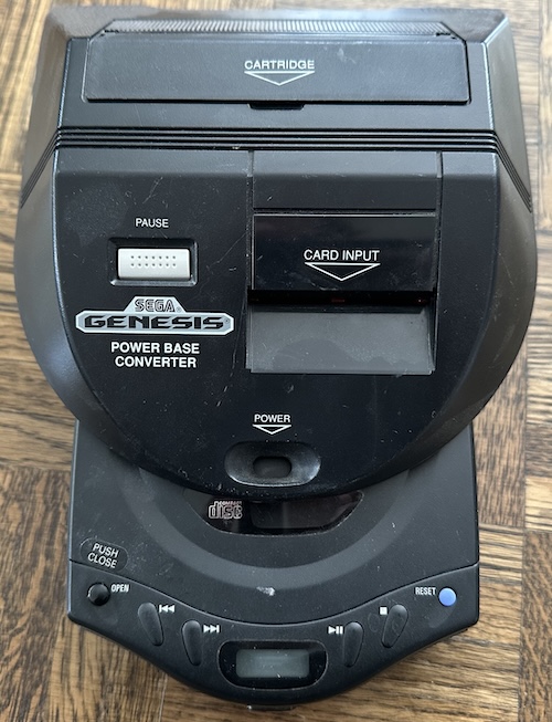 some sort of parasitic mushroom has colonized my CDX, help The Power Base Converter on the CDX. It is wider and longer, and the power light isn't where it says it is, but it does technically fit.