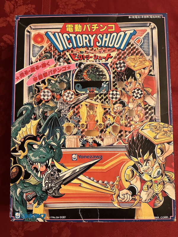 Victory Shoot box, with a Dragon Quest inspired logo and 'we have akira toreyama at home' art