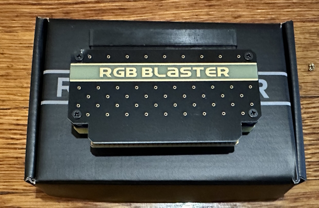 RGB Blaster sitting on its box