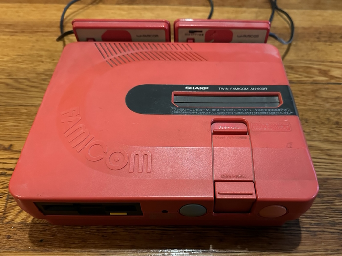 A red Twin Famicom