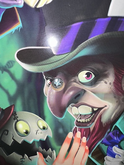 the art can have a grotesque lean, but nowhere near full american mcgee Side art with a screw-hole almost but not quite in the mad hatter's eye