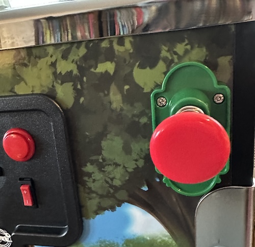 pew pew The shooter, which has a red knob and a green keyhole mount