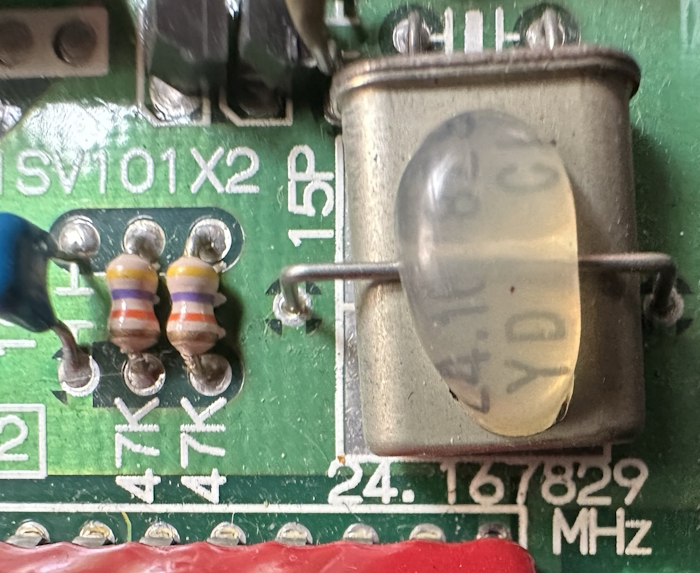 A slighlty larger oscillator can labeled 24.167829.