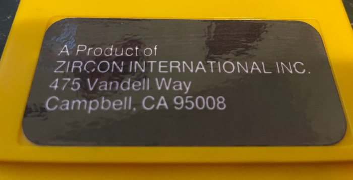 A sticker on the back of the Channel F cartridge. It says Zircon International and an address