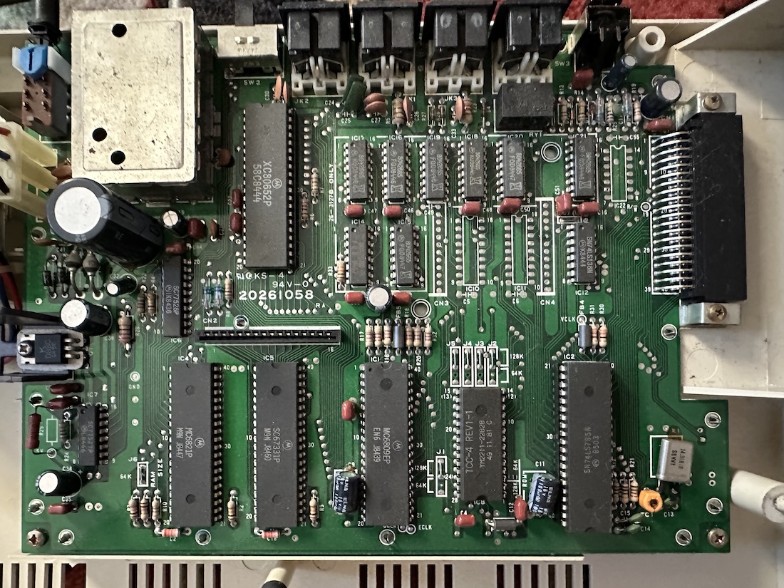 that's a lot of chips; this many chips on a budget machine shows its age Tandy Color Computer 2 circuit board.