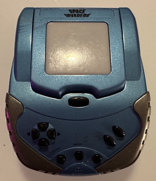 The blue and grey space invaders, with a translucent piece of plastic for the screen