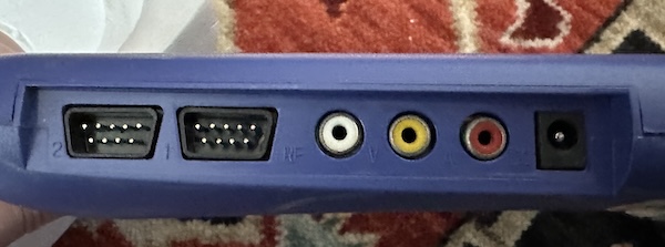 Ports; two DB-9 controllers, red yellow and white RCA jacks, and power