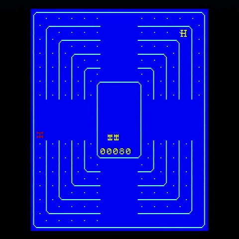 Gameplay of Sega's Head-On. A yellow car in a maze of dots.