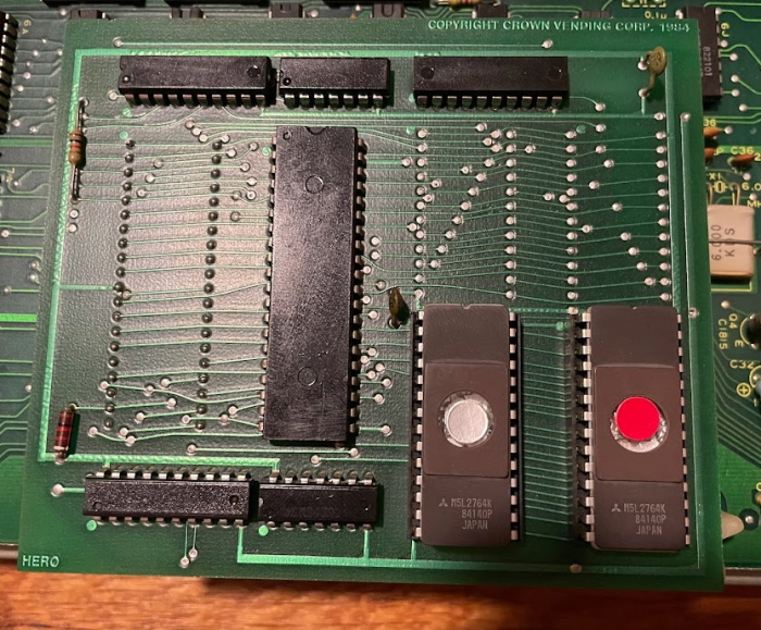 A smaller board. The chips are black and unmarked, except for the eproms