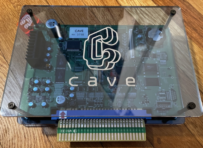 the CAVE CV-1000 PCB now safely enveloped on top and bottom but not the sides by resin