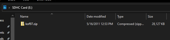 Windows File Explorer showing a single file on an SD card, kof97.zip