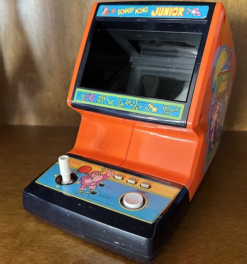 On the side, Donkey Kong was pink and Jr. was brown. On the front, Jr. is pink. Why would the Illuminati do this to me, Nicole? Front View