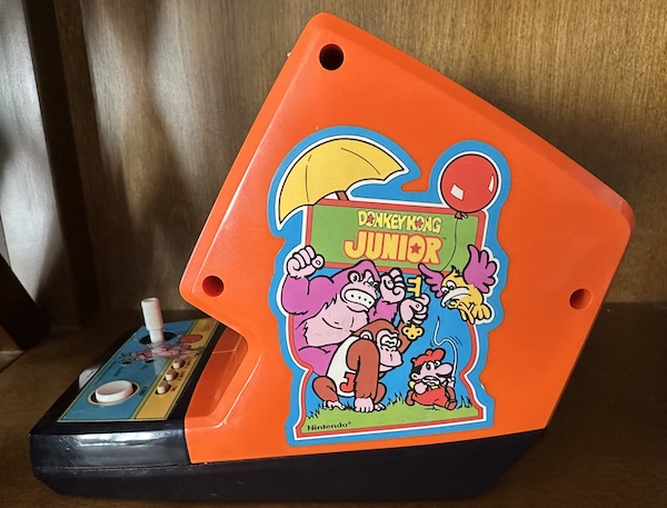 D! K! Donkey Kong! He's the pinkest of the bunch, you know him well! Side View