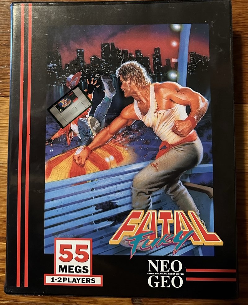 Fatal Fury 1 Neo Geo, with the box art modified to have the SNES cartridge being punched off the building