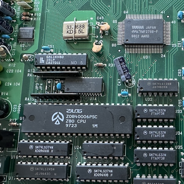 Audio section, highlighted by a through-hole Z80 and a surface-mount Yamaha YMF278