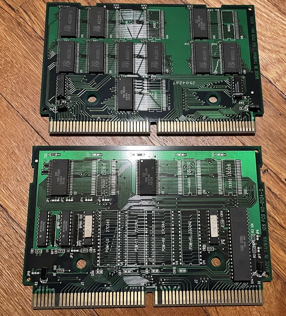Two boards, with predominately surface-mount chips