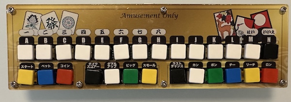 apparently this appearance mimics that of the game Royal Mahjong? but I don't have that game to compare Controls of Mahjong games. Two rows, the top letters A through N, the bottom have various labels