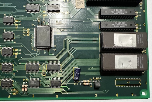 this is the rough part of town Neighborhood of the 64-pin chip, showing two EEPROMs