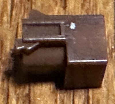 A Kailh box switch slider, with a tiny notch