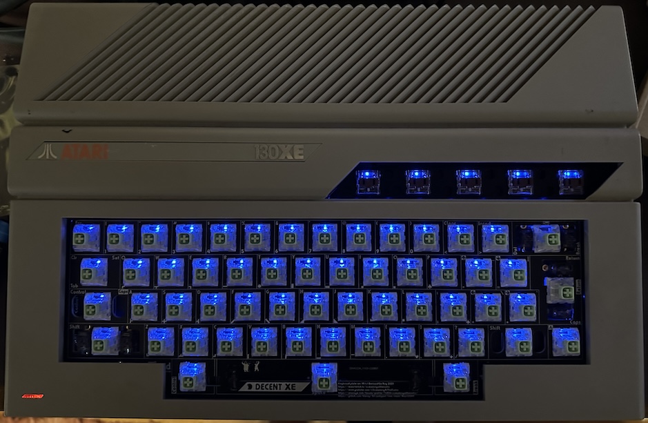 New keyboard with exposed switches, lit up in the dark