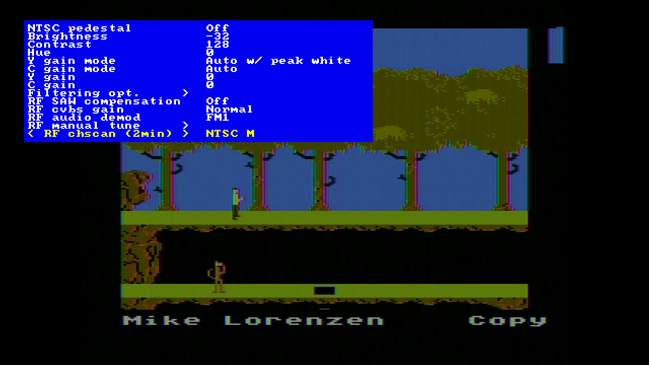 spoilers for the next section Atari 130XE running Pitfall II with a host of video options shown, including NTSC Pedestal, Brightness, Contrast, and others