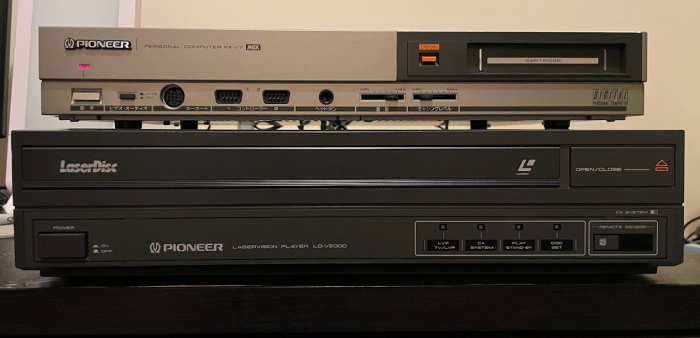 The PX-V7 sitting atop a LaserDisc player