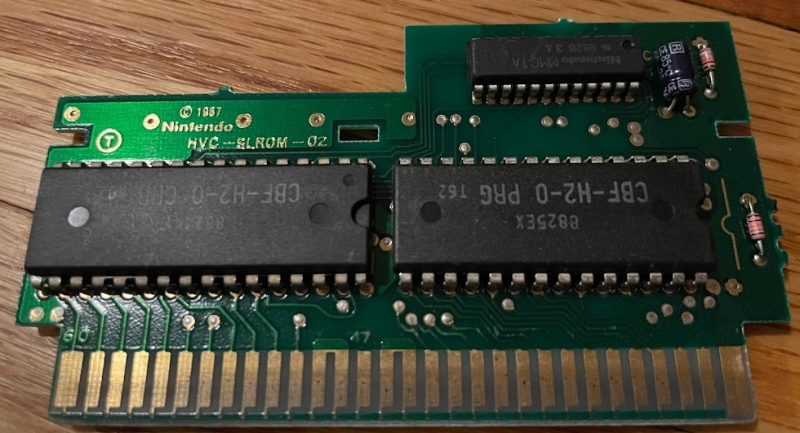 A board with the Nintendo MMC1. There are three chips; a CHR-ROM, PRG-ROM, and a smaller IC
