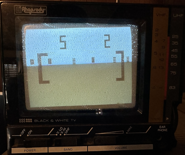 Gameplay of Pong Sports IV on a black-and-white TV