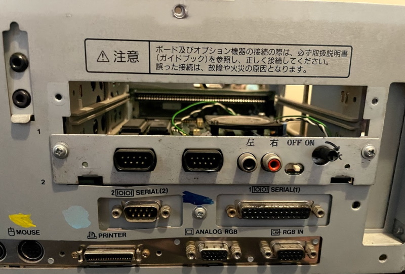 Rear of the PC-9821, showing a sound card and ports.
