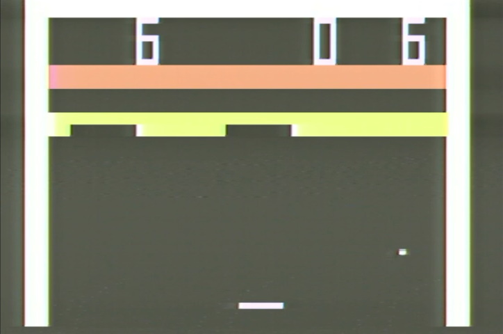 Breakaway. The paddle is at the bottom the screen, and there are two rows of blocks at the top. The two rows of blocks are separated