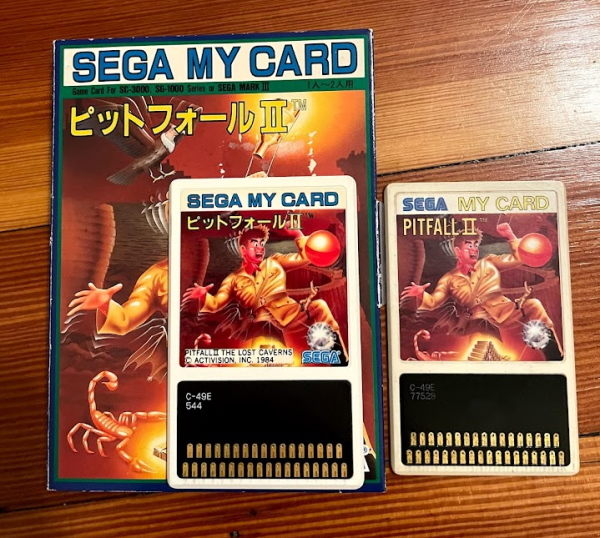 The SG-1000 version of Pitfall II. On the left, a boxed version with a card that has katakana text and an additional activision copyright. The right one is the same card seen earlier in the post.
