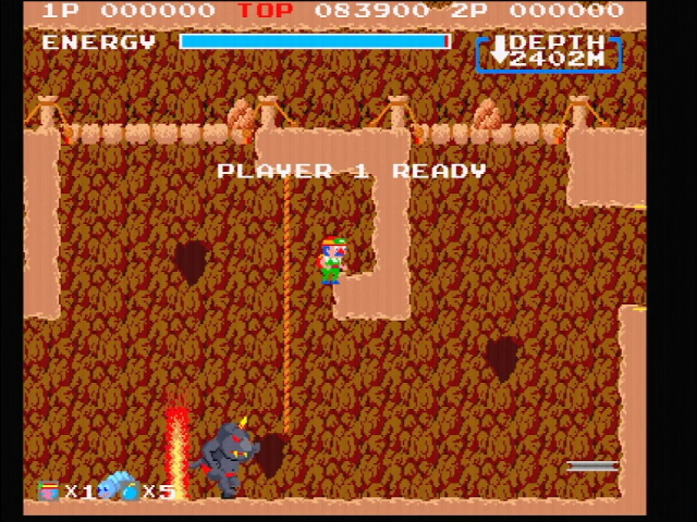 Spelunker arcade gameplay. Spelunker guy is on top of a rope while a large dark grey enemy lurks below