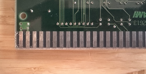 The JAMMA edge on the reverse side of the PCB, showing pads not connected to anything