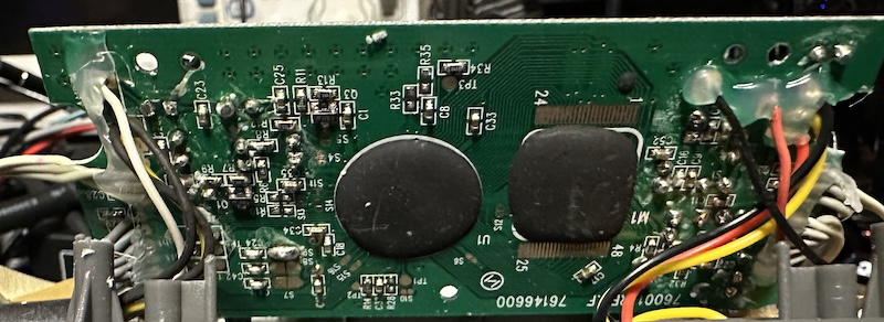 A circuit board with two epoxy blobs