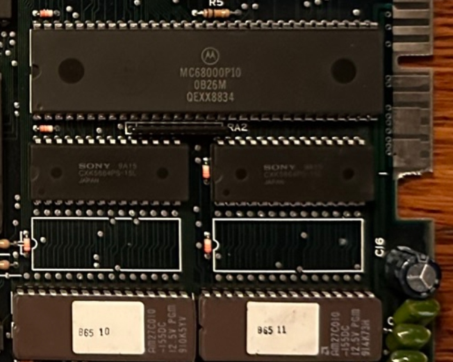 A Motorola 68000, two RAM chips, and two ROMs. There are also some sockets