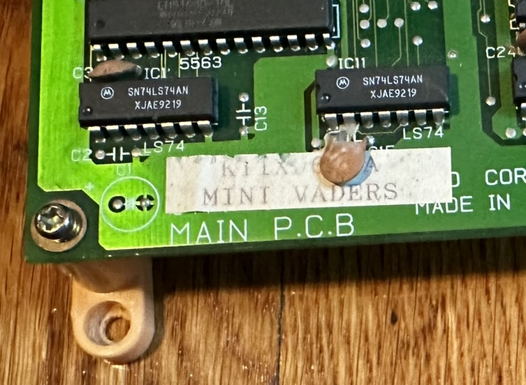 The label says MINI-VADERS. It is obscured by a decoupling capacitor that seems to have white lines on it